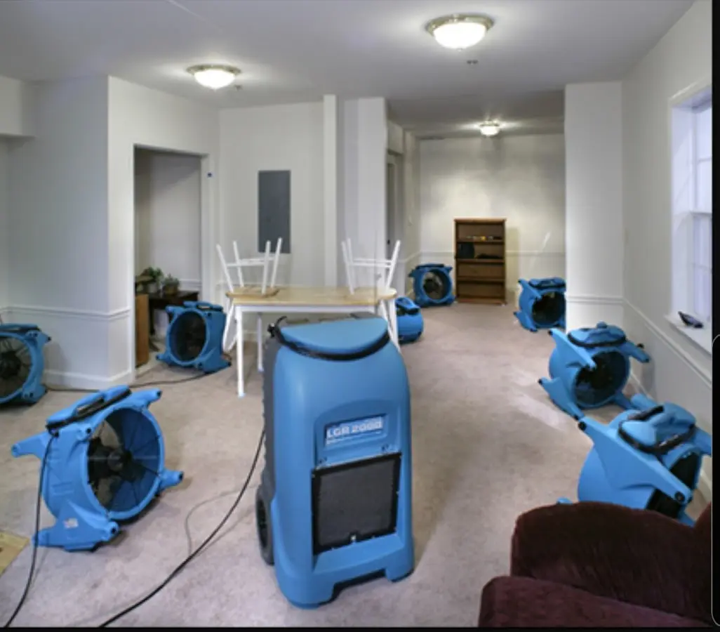 Air movers and dehumidifier setup for Water Damage Restoration in Southside